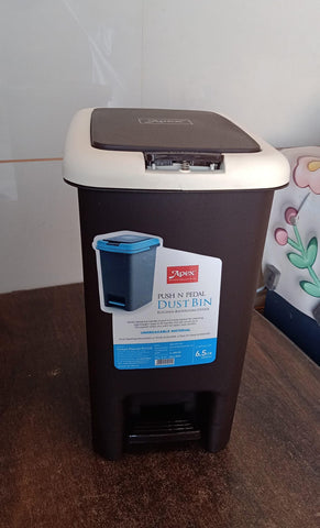 Plastic Push N Pedal Dust Bin | Hands-Free Operation, Compact Design, Unbreakable Plastic | Ideal for Kitchen, Office & Bathroom Use 6.5 Litres (1 Pc / Mix Color) Description :- Keep your surroundings clean and clutter-free with this 6.5 Litre Push N Peda
